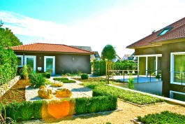 Gilbert Gartengestaltung - Garten rund ums Haus 